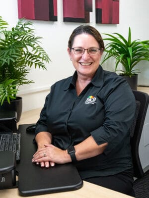 Carla Seirlis at desk